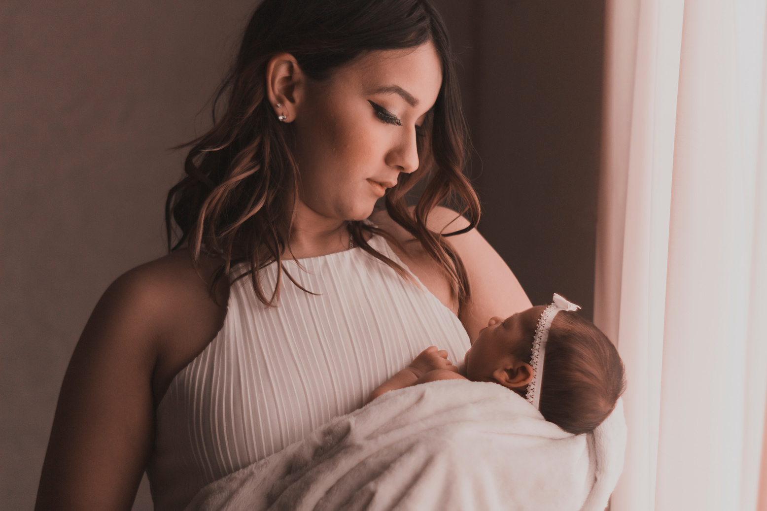 Woman Carrying Baby